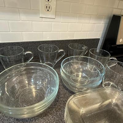 Beautiful glass sets including plates, mugs and bowls.