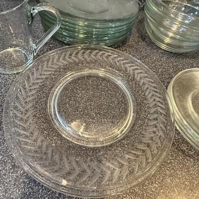 Beautiful glass sets including plates, mugs and bowls.