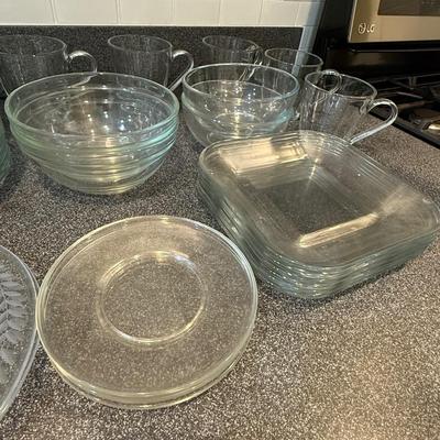 Beautiful glass sets including plates, mugs and bowls.