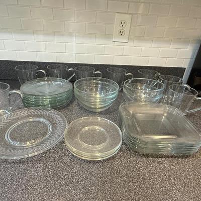 Beautiful glass sets including plates, mugs and bowls.