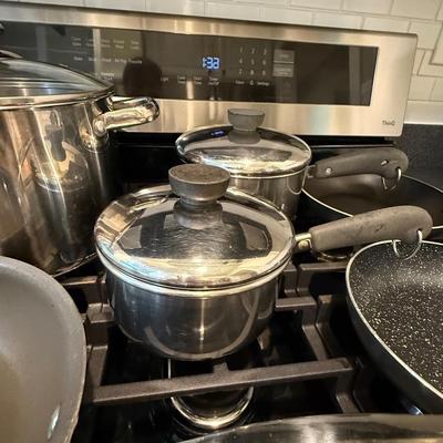 3 frying pans and 3 pots