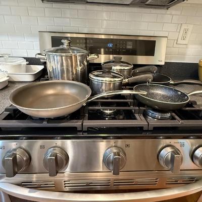 3 frying pans and 3 pots