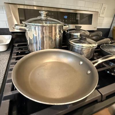3 frying pans and 3 pots