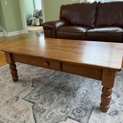 Wood coffee table with drawer