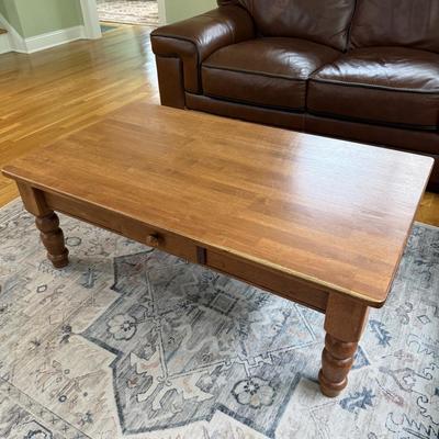 Wood coffee table with drawer