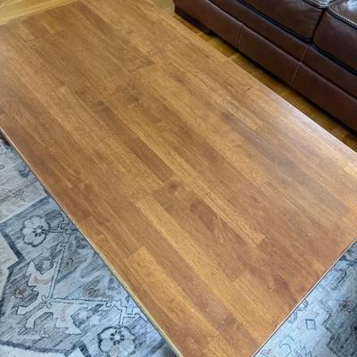 Wood coffee table with drawer