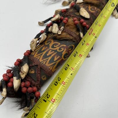 Sale Photo Thumbnail #413: *Missing the main blade

This is a striking Dayak tribal knife with its original scabbard, originating from Borneo (Kalimantan, Indonesia). Richly decorated and deeply symbolic, this ceremonial piece reflects the craftsmanship and cultural traditions of t