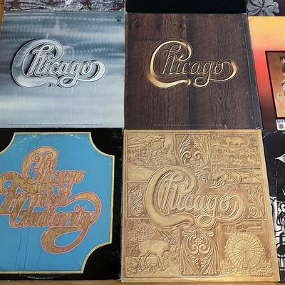 Sale Photo Thumbnail #448: This is a fantastic vintage vinyl lot featuring 16 iconic classic rock and pop albums from the golden era of music. The highlight of this collection is an incredible 9 albums from Chicago, including titles under both “Chicago” and “Chicago Transit A