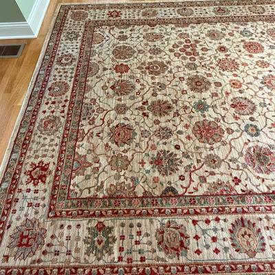 Cream, red and teal rug