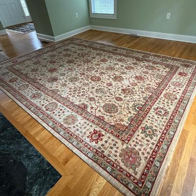 Cream, red and teal rug