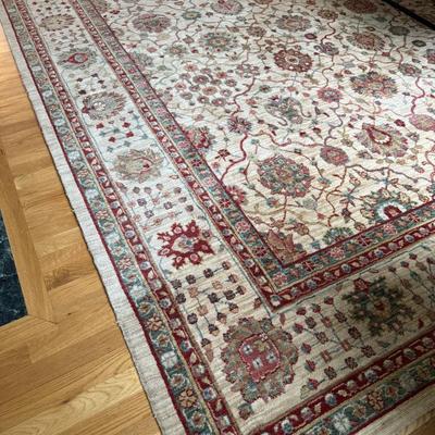 Cream, red and teal rug