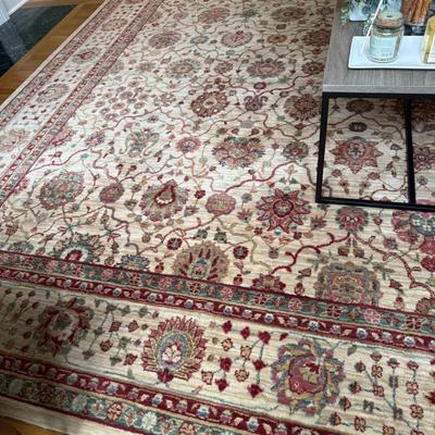 Cream, red and teal rug