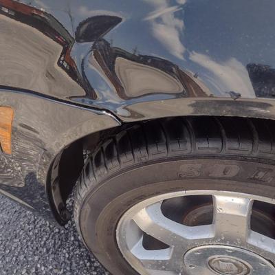 Sale Photo Thumbnail #97: 2004 CTS Cadillac Four-Door. Starts and drives.  Will need a new ECM.  Some exterior cosmetic scrapes and dents as shown.   No warranties or guarantees.  As is where it sits.  Cash, cashier's check, or wire transfer only for payment.  No exceptions.  No o