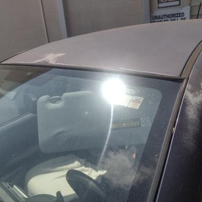 Sale Photo Thumbnail #115: 2007 Honda Fit 4 Speed Manual Shift.  Starts and drives.  Will need a new battery.  Prepare to tow off lot due to unknown condition of tires.  Cosmetic exterior paint peeling and dents as shown.   No warranties or guarantees.  As is where it sits.  Cash, 