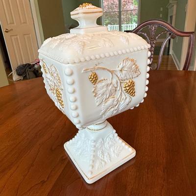 Milk glass footed container with lid