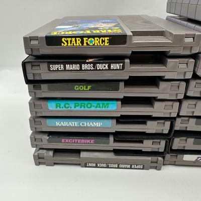 Sale Photo Thumbnail #498: SNES Games:
	•	Street Fighter II Turbo
	•	Street Fighter II
	•	Joe and Mac
	•	WWF Super WrestleMania
	•	Super Baseball Simulator 1.000
	•	NES Games:
	•	Metroid
	•	Final Fantasy
	•	Tecmo Bowl
	•	Rad Racer II
	•	Pro Wrestling
	•	Exci