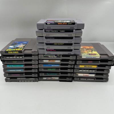 Sale Photo Thumbnail #497: SNES Games:
	•	Street Fighter II Turbo
	•	Street Fighter II
	•	Joe and Mac
	•	WWF Super WrestleMania
	•	Super Baseball Simulator 1.000
	•	NES Games:
	•	Metroid
	•	Final Fantasy
	•	Tecmo Bowl
	•	Rad Racer II
	•	Pro Wrestling
	•	Exci