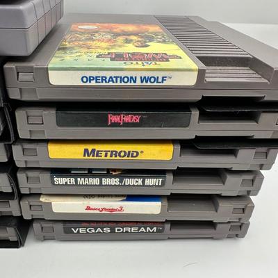 Sale Photo Thumbnail #502: SNES Games:
	•	Street Fighter II Turbo
	•	Street Fighter II
	•	Joe and Mac
	•	WWF Super WrestleMania
	•	Super Baseball Simulator 1.000
	•	NES Games:
	•	Metroid
	•	Final Fantasy
	•	Tecmo Bowl
	•	Rad Racer II
	•	Pro Wrestling
	•	Exci