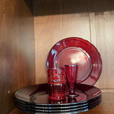 Red glass plates and miscellaneous items