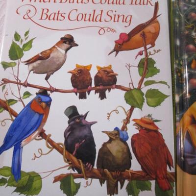 4 hard cover children's books