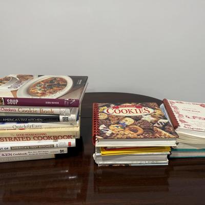 Lot of cook books.. even more in a bin not shown!
