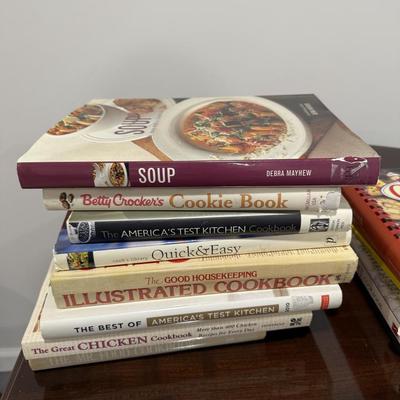 Lot of cook books.. even more in a bin not shown!