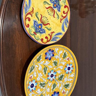 Two pretty painted plates
