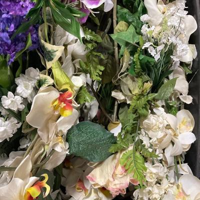 Tote of faux flowers and mini trees