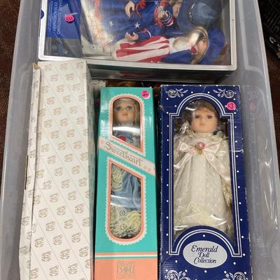 Dolls in grey tote