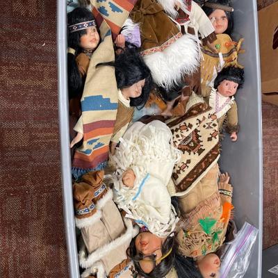 Large tote with Native dolls and pillows underneath