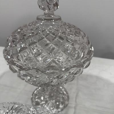 One heavy and beautiful lidded and footed crystal dish and one tray