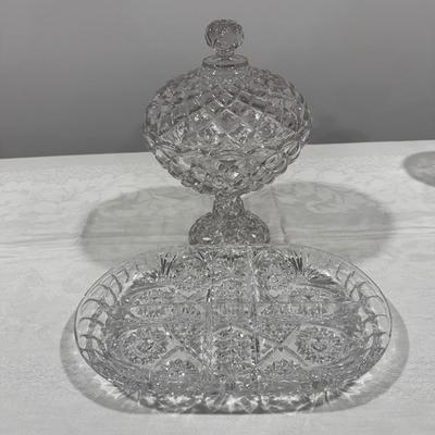 One heavy and beautiful lidded and footed crystal dish and one tray