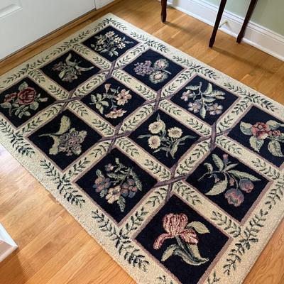 Floral navy and tan color block rug 4.10 x 5.4