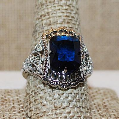 Size 10 Large Deep BLUE Beveled Rectangle Stone on a "Spider Web" Style Setting on a Silver Tone Band (5.6g)