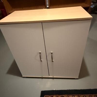 White cabinet with silver pulls