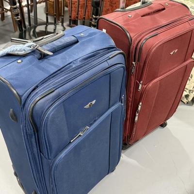 Two Crewline suitcases