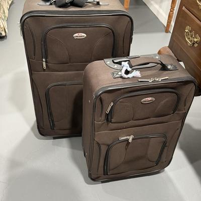 Two Concourse suitcases