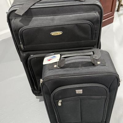 Two black suitcases