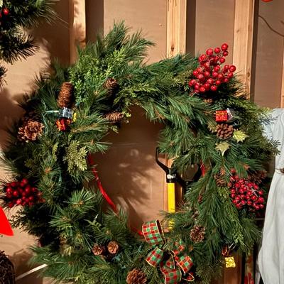Four holiday wreaths