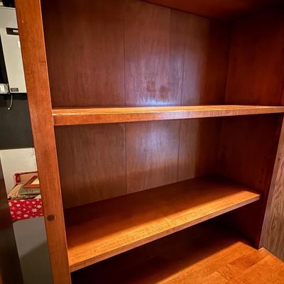 Two matching beautiful wood bookcases with cabinets