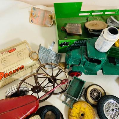 LOT 220: Large Assortment of Vintage Toy Car Wheels, Pieces and Parts