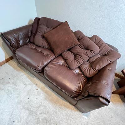 Lot 74 Leather/ Suede Love seat