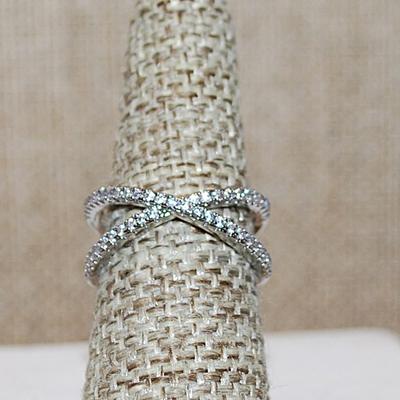 Size 7 Half Infinity Style Criss-Cross Ring with 2 Rows of Small Stones on a Silver Tone Band (2.8g)