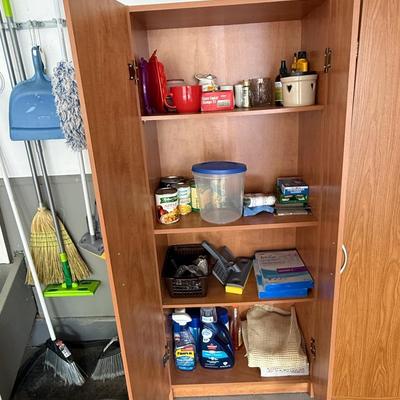 Storage cabinet with silver pulls