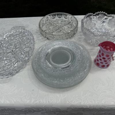 Lot of gorgeous crystal and glass platters, bowls, plates and little pitcher