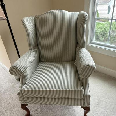 Green and white striped arm chair
