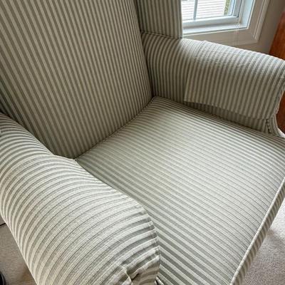 Green and white striped arm chair
