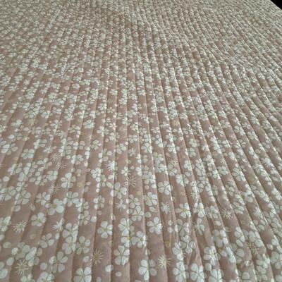 Pretty pink and white queen quilt