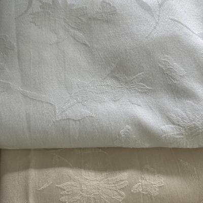 Cream and white tablecloths, 98” and 115”