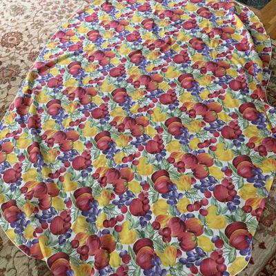 Oval tablecloth with two matching sets of napkins